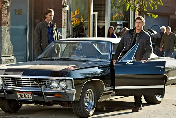 Sam and Dean getting into their Chevy Impala.