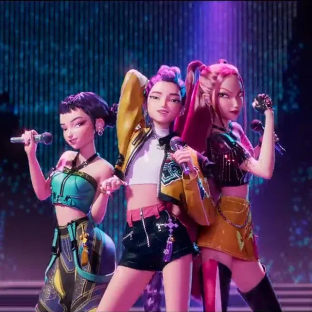 Rumi, Mira, and Zoey posed together with microphones under stage lights