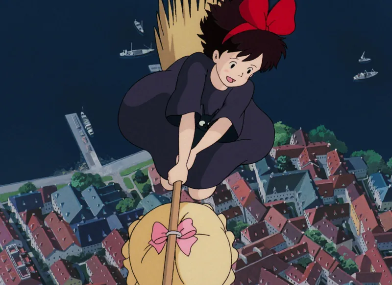 Illustration of Kiki on a magical broom, flying over a cityscape